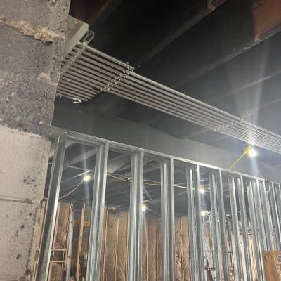 A Building With A Metal Fence