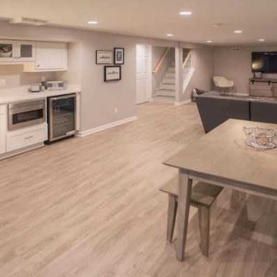 A Kitchen With A Hard Wood Floor