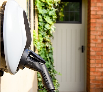 a motorcycle parked on the side of a building