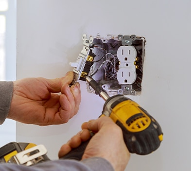 a hand holding a knife