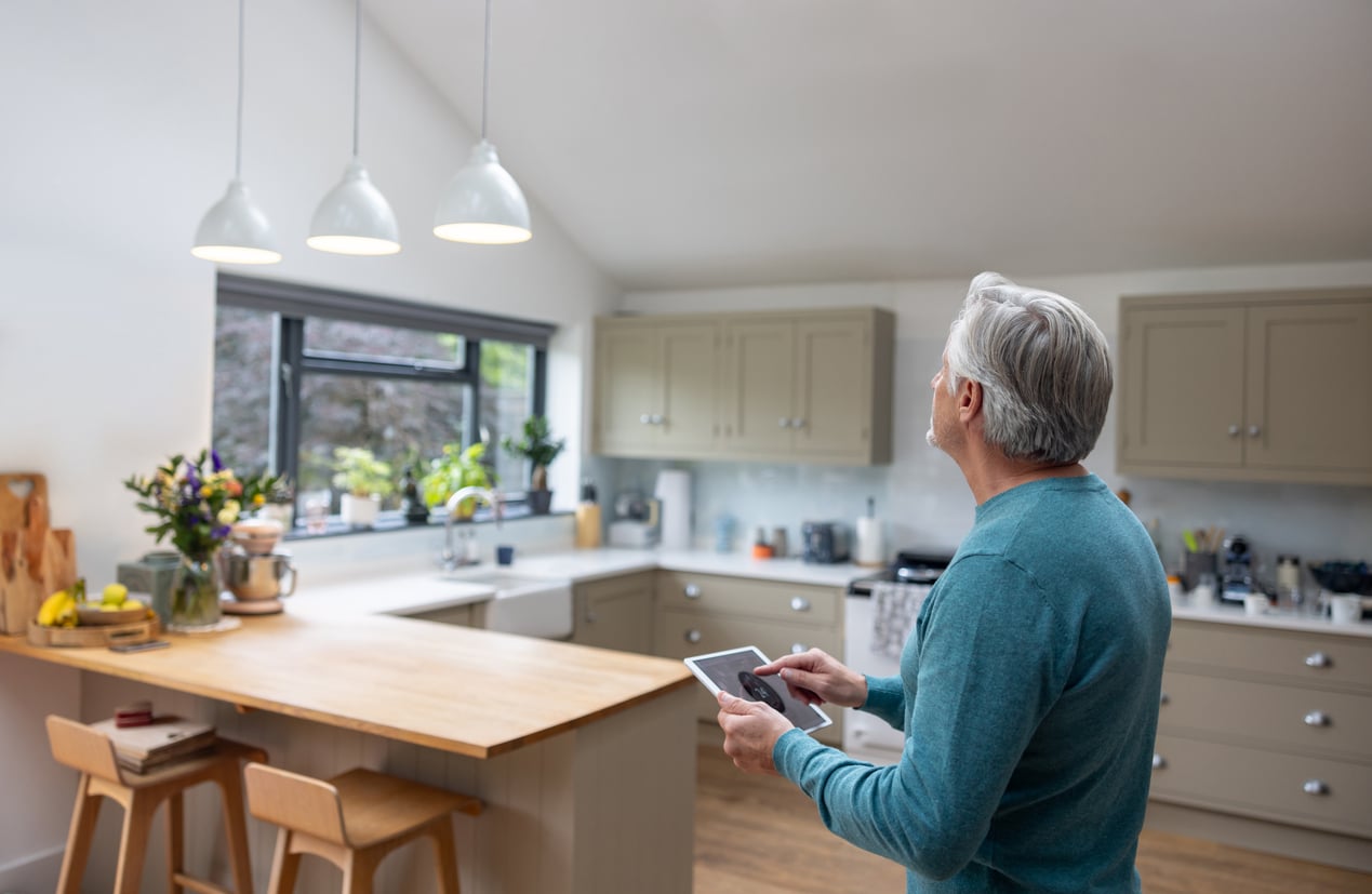 a person standing in a kitchen